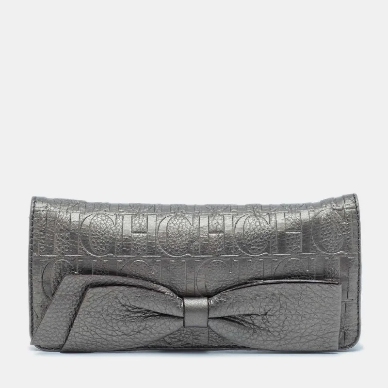 Carolina Herrera Metallic Monogram Embossed Leather Audrey Clutch